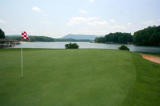 view of home's community featuring a water view