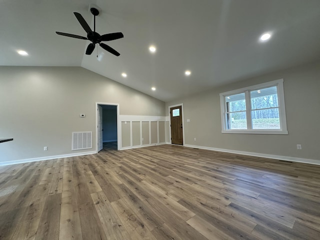 unfurnished living room featuring visible vents, ceiling fan, recessed lighting, wood finished floors, and vaulted ceiling
