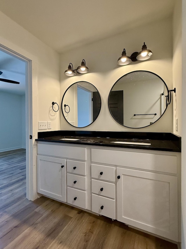 1484 White House Rd, Moneta, VA 24121 - bathroom featuring wood finished floors and double vanity