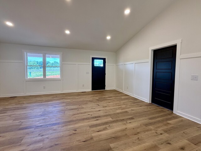 1484 White House Rd, Moneta, VA 24121 - foyer entrance with a decorative wall, healthy amount of natural light, wood finished floors, a wainscoted wall, and recessed lighting