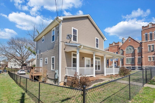 728 Jamison Ave SE, Roanoke, VA 24013 - view of front of property with a fenced front yard, covered porch, and a front lawn