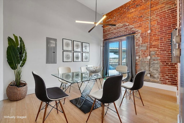 133 Norfolk Ave SW, Roanoke, VA 24011 - dining area with electric panel, high vaulted ceiling, baseboards, wood finished floors, and a ceiling fan