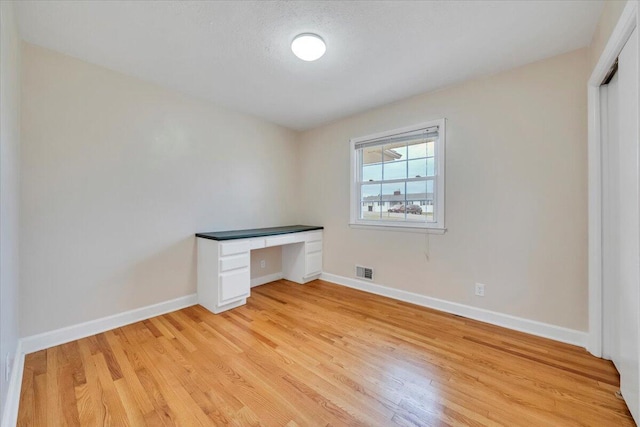 1401 Grove Dr, Pulaski, VA 24301 - unfurnished office with baseboards, visible vents, and light wood-style flooring
