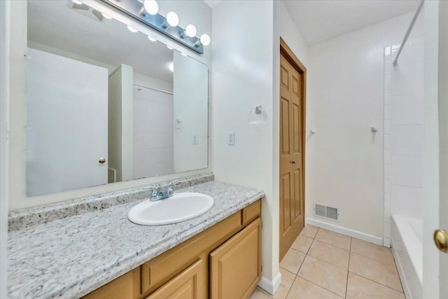 1401 Grove Dr, Pulaski, VA 24301 - full bath featuring vanity, baseboards, tile patterned flooring, and visible vents