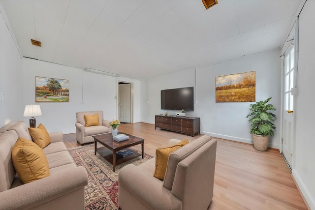 1401 Grove Dr, Pulaski, VA 24301 - living area with light wood-type flooring and baseboards