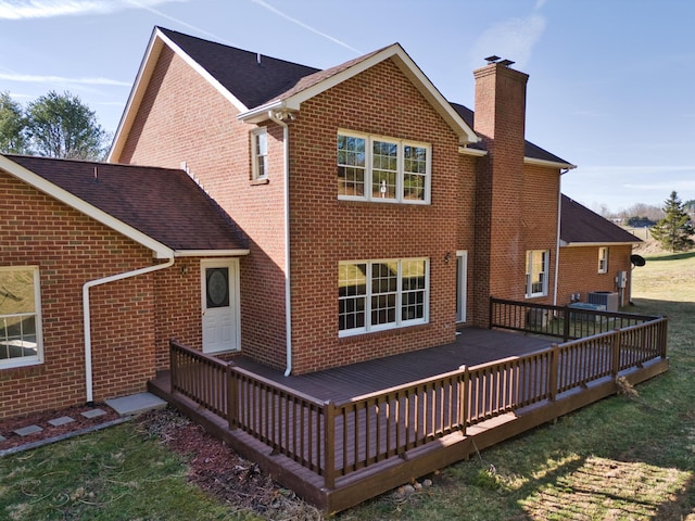 195 Showalter Rd NW, Willis, VA 24380 - rear view of house with a chimney, brick siding, a deck, and a shingled roof