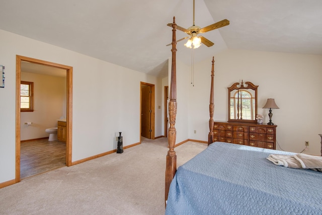 195 Showalter Rd NW, Willis, VA 24380 - bedroom with light carpet, vaulted ceiling, connected bathroom, and ceiling fan
