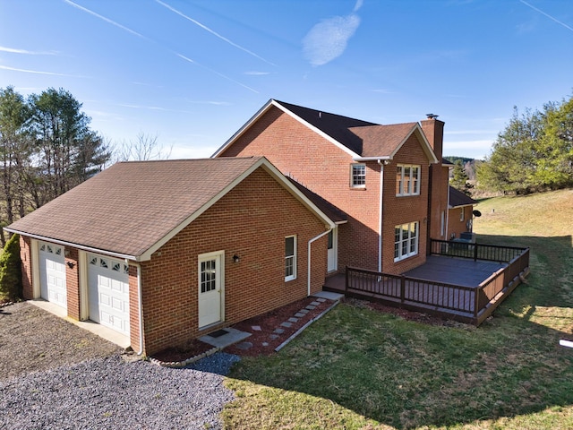 195 Showalter Rd NW, Willis, VA 24380 - view of property exterior featuring brick siding, a chimney, and a lawn