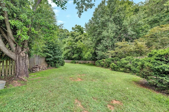 view of yard featuring fence