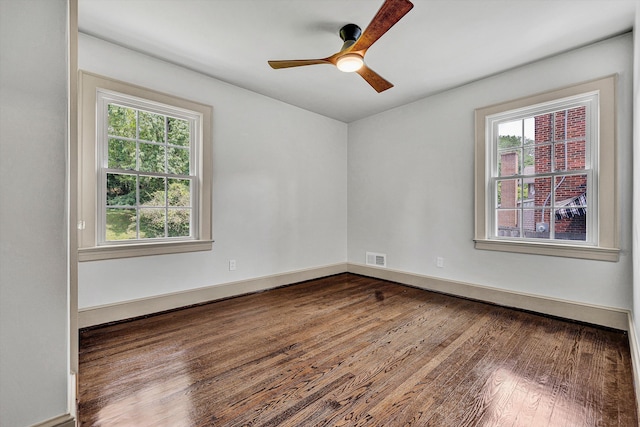2619 Carolina Ave SW, Roanoke, VA 24014 - empty room with wood finished floors, ceiling fan, and baseboards