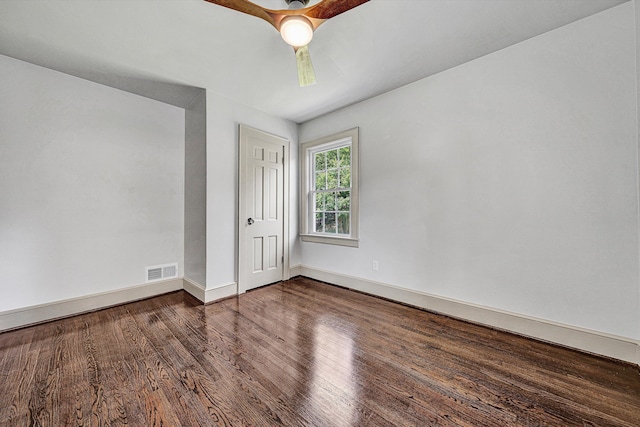 2619 Carolina Ave SW, Roanoke, VA 24014 - spare room with wood finished floors, baseboards, and a ceiling fan