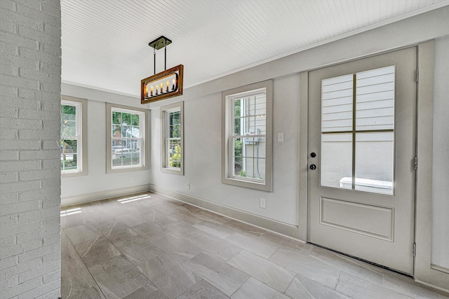 2619 Carolina Ave SW, Roanoke, VA 24014 - unfurnished dining area with a chandelier and baseboards