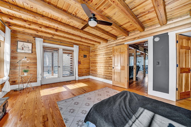 1536 Mount Airy Rd, Lynch Station, VA 24571 - bedroom with wooden ceiling, french doors, wood walls, wood-type flooring, and beamed ceiling