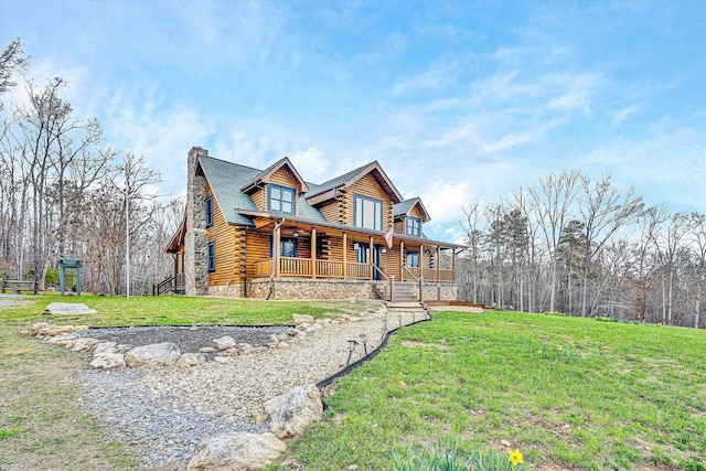 1536 Mount Airy Rd, Lynch Station, VA 24571 - log-style house featuring log siding, covered porch, a chimney, and a front lawn