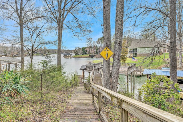 dock area featuring a water view