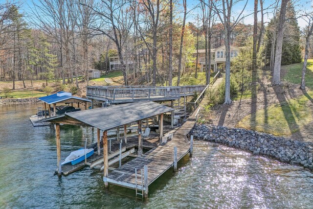view of dock featuring a water view and boat lift