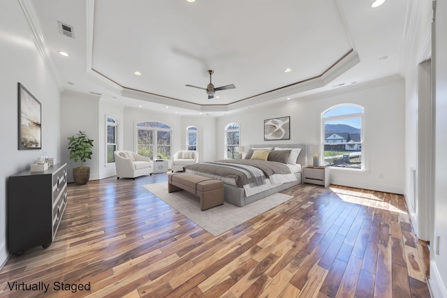 7425 Willow Leaf Cir, Roanoke, VA 24018 - bedroom with a raised ceiling, multiple windows, wood finished floors, crown molding, and recessed lighting