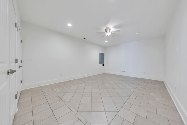 7425 Willow Leaf Cir, Roanoke, VA 24018 - spare room with a ceiling fan, electric panel, recessed lighting, light tile patterned floors, and baseboards