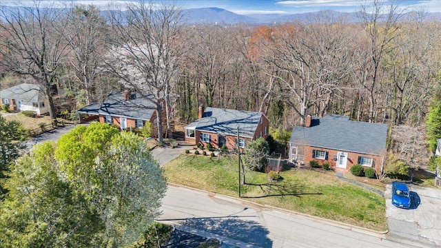 drone / aerial view featuring a mountain view