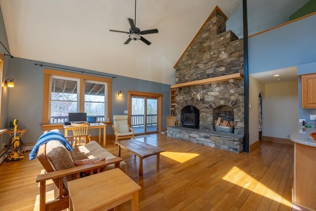 475 Loss Bent Rd NW, Riner, VA 24149 - living room featuring high vaulted ceiling, ceiling fan, light wood finished floors, and baseboards