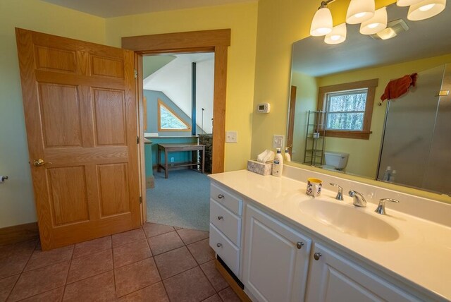 475 Loss Bent Rd NW, Riner, VA 24149 - bathroom with vanity, a shower stall, toilet, and tile patterned floors
