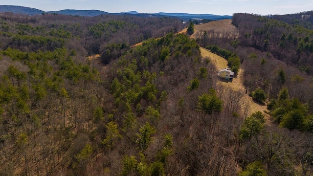 475 Loss Bent Rd NW, Riner, VA 24149 - aerial view of property's location featuring a mountain backdrop and a heavily wooded area