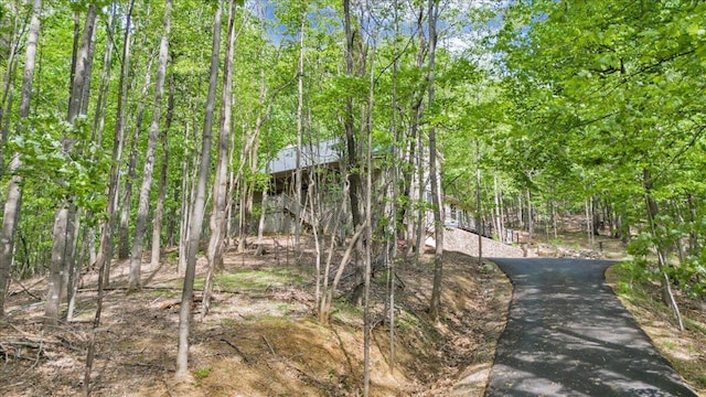 exterior space featuring stairs and driveway