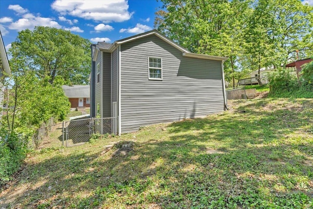 1113 17th St SE, Roanoke, VA 24013 - view of side of property with a lawn and fence