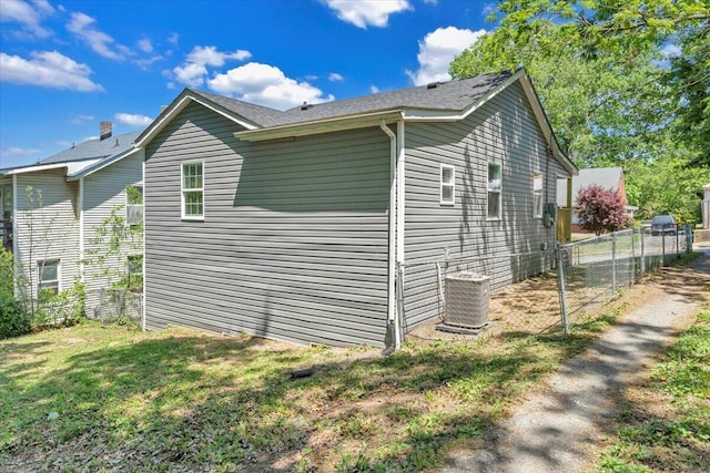 1113 17th St SE, Roanoke, VA 24013 - view of property exterior featuring fence, central air condition unit, and a lawn