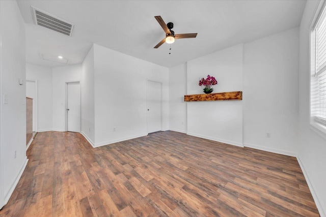 1113 17th St SE, Roanoke, VA 24013 - unfurnished room featuring ceiling fan, visible vents, plenty of natural light, and wood finished floors