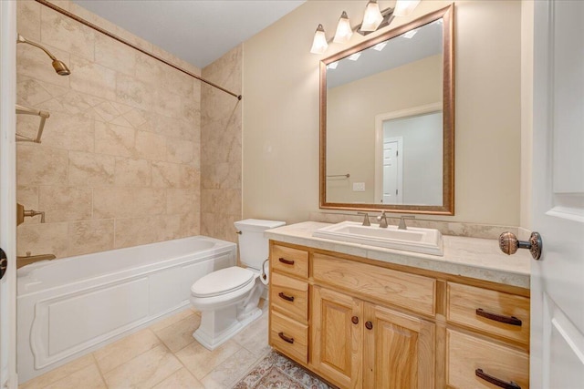 full bath with tile patterned floors, toilet, vanity, and bathing tub / shower combination