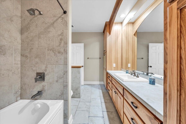 bathroom with baseboards and vanity