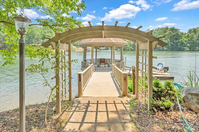 view of dock with a water view and a gazebo