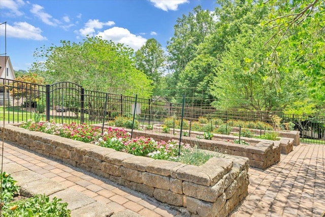view of yard featuring a garden and fence