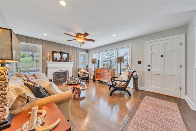 721 Mount Vernon Ave, Salem, VA 24153 - living room featuring a ceiling fan, wood finished floors, a brick fireplace, baseboards, and recessed lighting