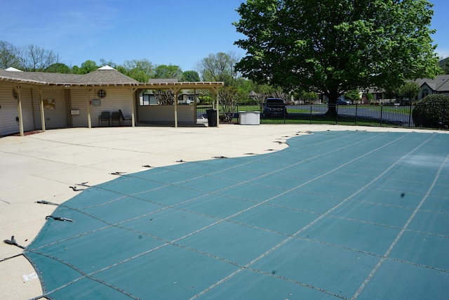 view of pool with a patio, fence, and a fenced in pool