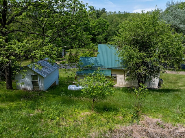 3512 Conner Grove Rd SW, Willis, VA 24380 - view of yard featuring an outbuilding and a view of trees