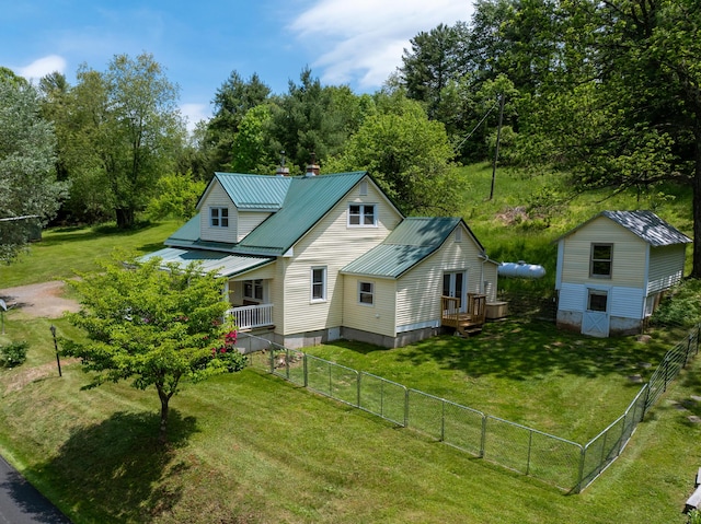3512 Conner Grove Rd SW, Willis, VA 24380 - rear view of property with metal roof, view of scattered trees, and covered porch