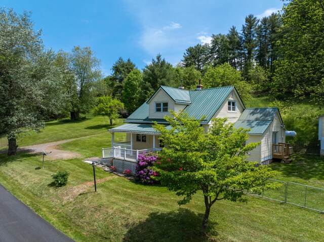 3512 Conner Grove Rd SW, Willis, VA 24380 - view of front of house featuring a porch, metal roof, and view of wooded area