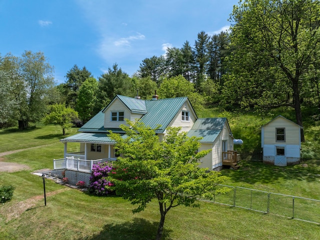 3512 Conner Grove Rd SW, Willis, VA 24380 - back of property with a porch, metal roof, and view of scattered trees