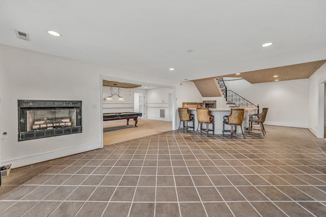 interior space featuring pool table, recessed lighting, a bar, stairs, and visible vents