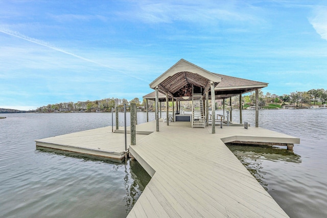 dock area with a water view