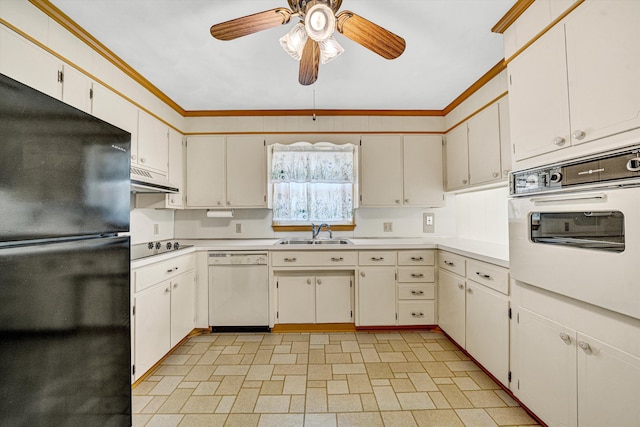 kitchen featuring light countertops, ceiling fan, a sink, and black appliances