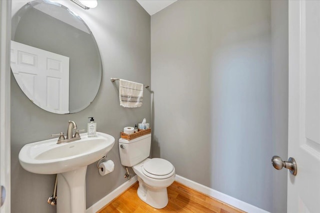 20 Ohara Dr, Daleville, VA 24083 - half bathroom featuring toilet, wood finished floors, and baseboards