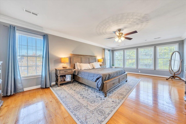 20 Ohara Dr, Daleville, VA 24083 - bedroom with visible vents, baseboards, ornamental molding, light wood-type flooring, and a ceiling fan