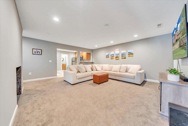 20 Ohara Dr, Daleville, VA 24083 - living room featuring baseboards, light colored carpet, a fireplace, and visible vents