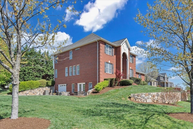 20 Ohara Dr, Daleville, VA 24083 - view of property exterior with a yard, brick siding, central AC unit, and an attached garage