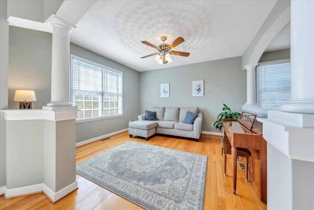20 Ohara Dr, Daleville, VA 24083 - living area with light wood-style floors, ornate columns, baseboards, and a ceiling fan