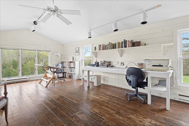 office with lofted ceiling, track lighting, wood-type flooring, a wealth of natural light, and a ceiling fan
