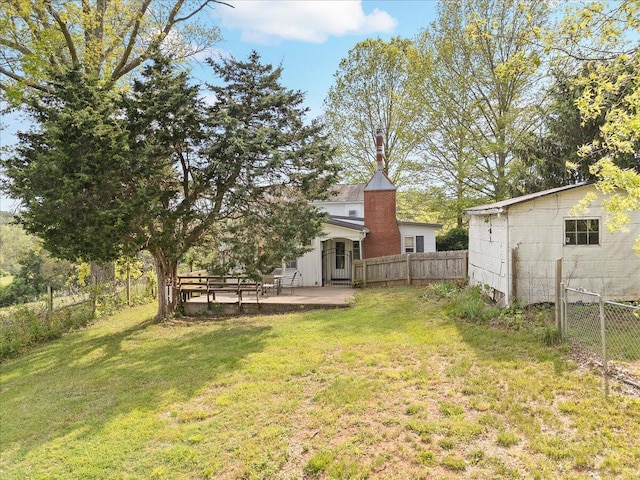 view of yard featuring a patio area and fence